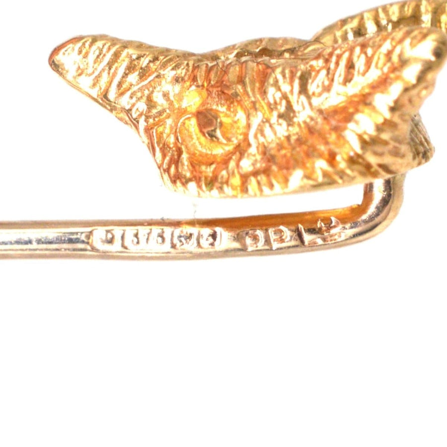 Close-up of a vintage 1970s 9ct gold fox head tie pin from Birmingham, by Payton, Pepper & Sons Ltd.