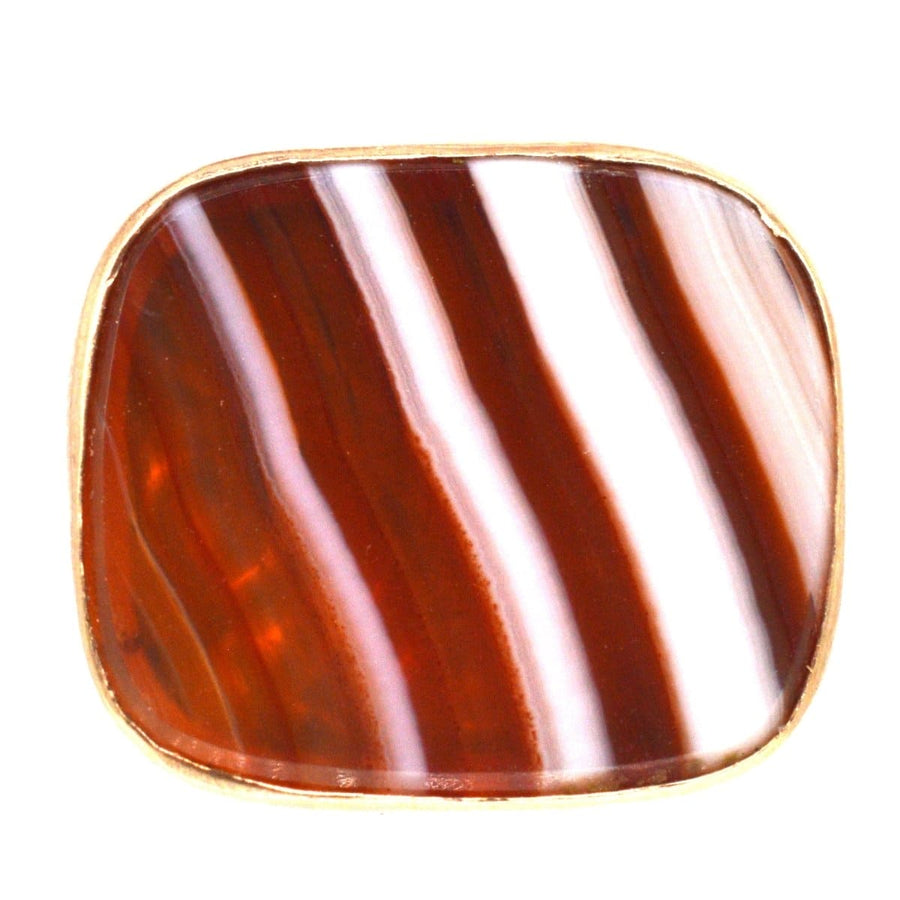 Antique 9ct gold banded agate seal pendant with rich brown and white stripes, showcasing vintage elegance.