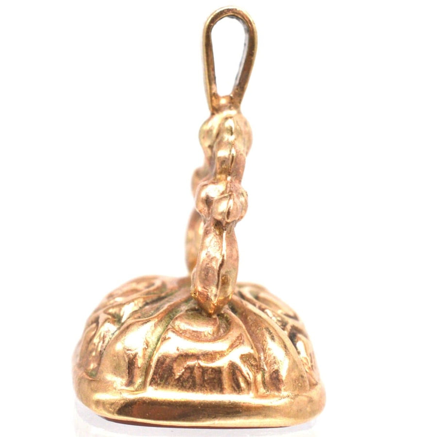 Vintage 9ct gold seal pendant with a banded agate base, showcasing antique design from 1972.
