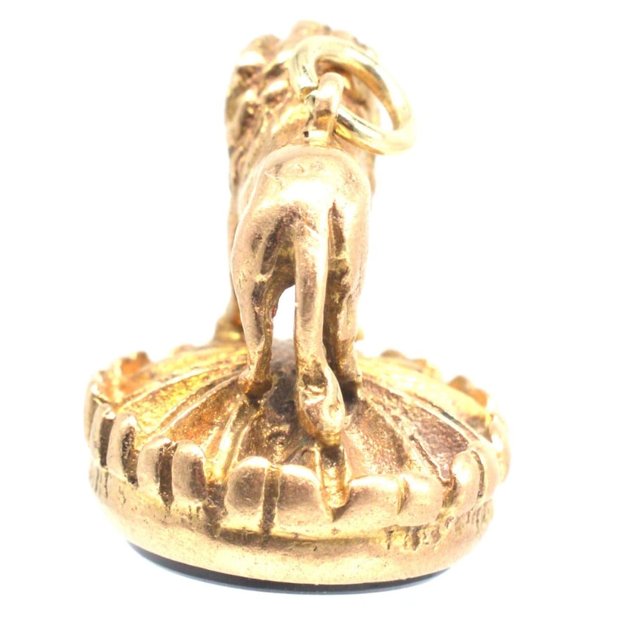 Vintage 9ct gold lion seal atop an oval onyx base, hallmarked, made in London 1967, perfect for lion lovers.