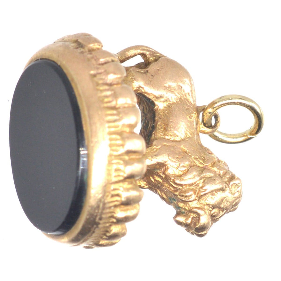Vintage 9ct gold lion seal with an oval onyx base, showcasing its regal design, perfect for lion lovers.