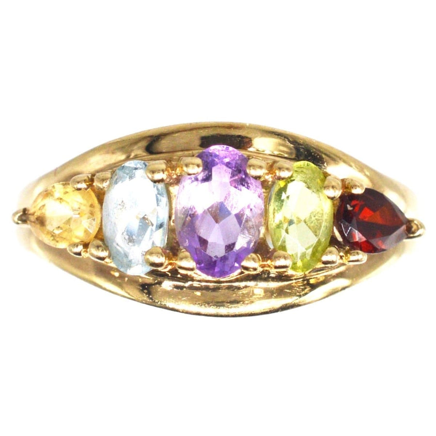 Vintage 9ct gold five stone ring with citrine, aquamarine, amethyst, peridot, and garnet gemstones.
