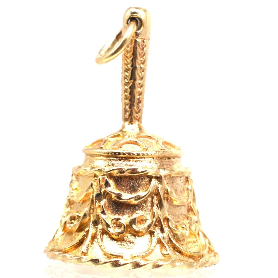 Vintage 9ct gold wedding ring pendant charm with intricate scroll design and hallmarks from 1968, London.