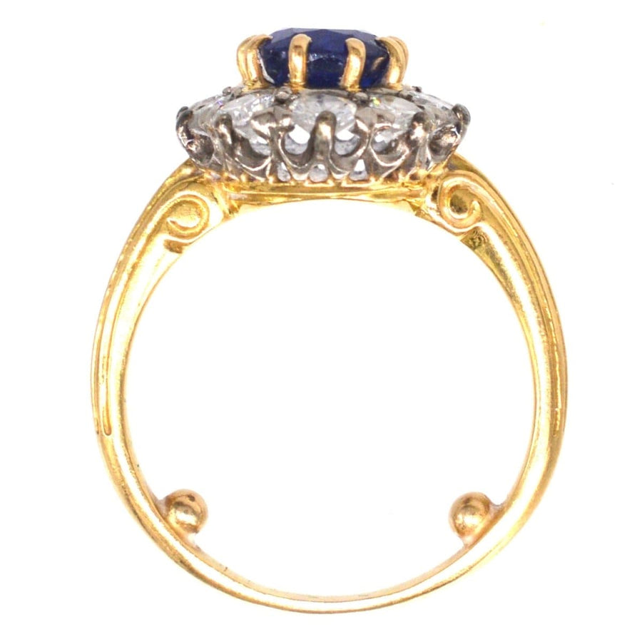Vintage French 1960s 18ct gold sapphire and diamond cluster ring with elegant shank and royal blue sapphire.