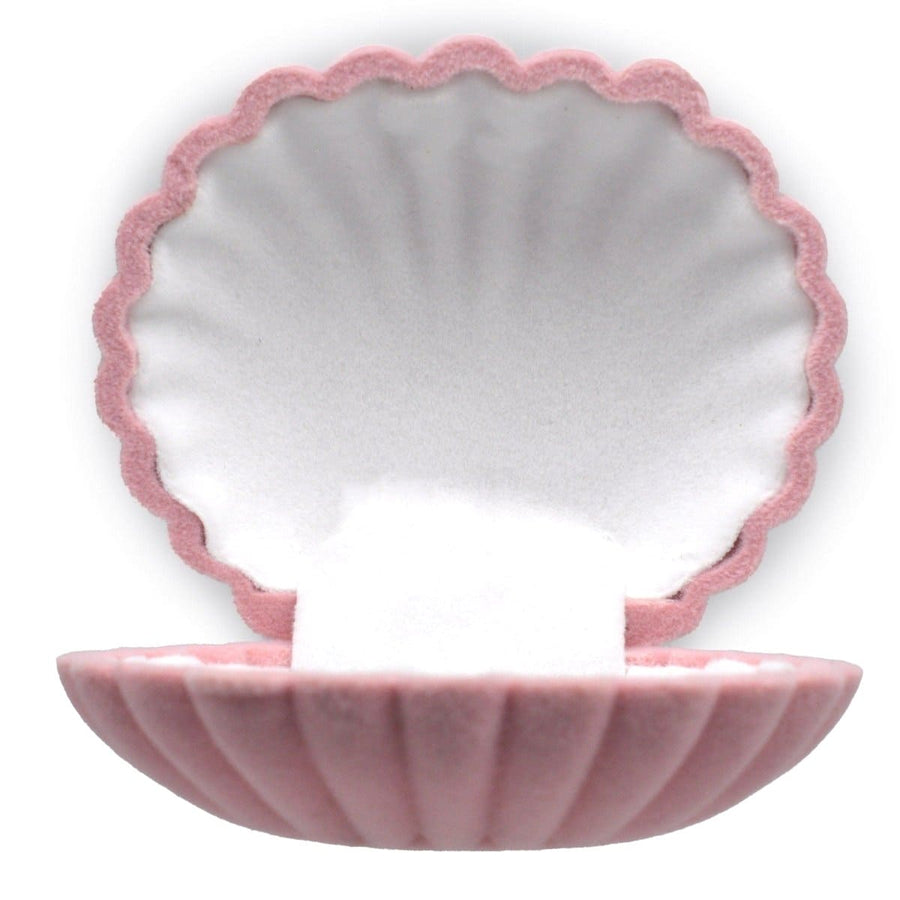 Vintage pink scallop shell jewellery display case, perfect for organizing and showcasing small pieces.