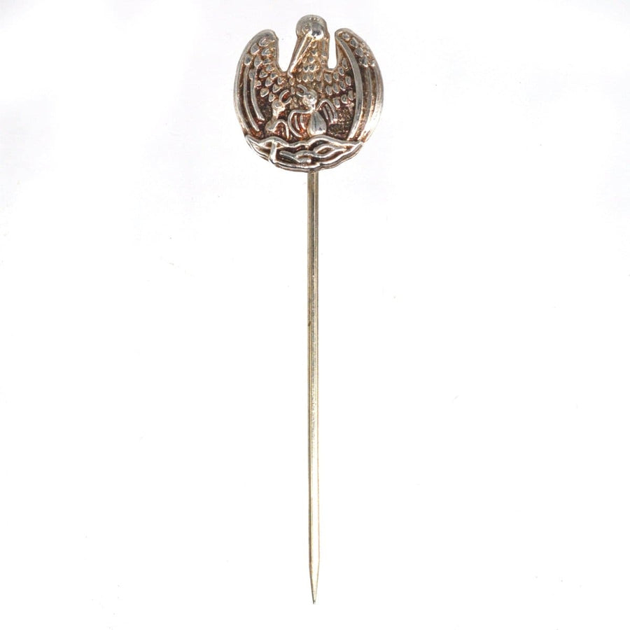 Vintage silver tie pin featuring the pelican in her piety, a symbol of sacrifice and selflessness, made in 1977.