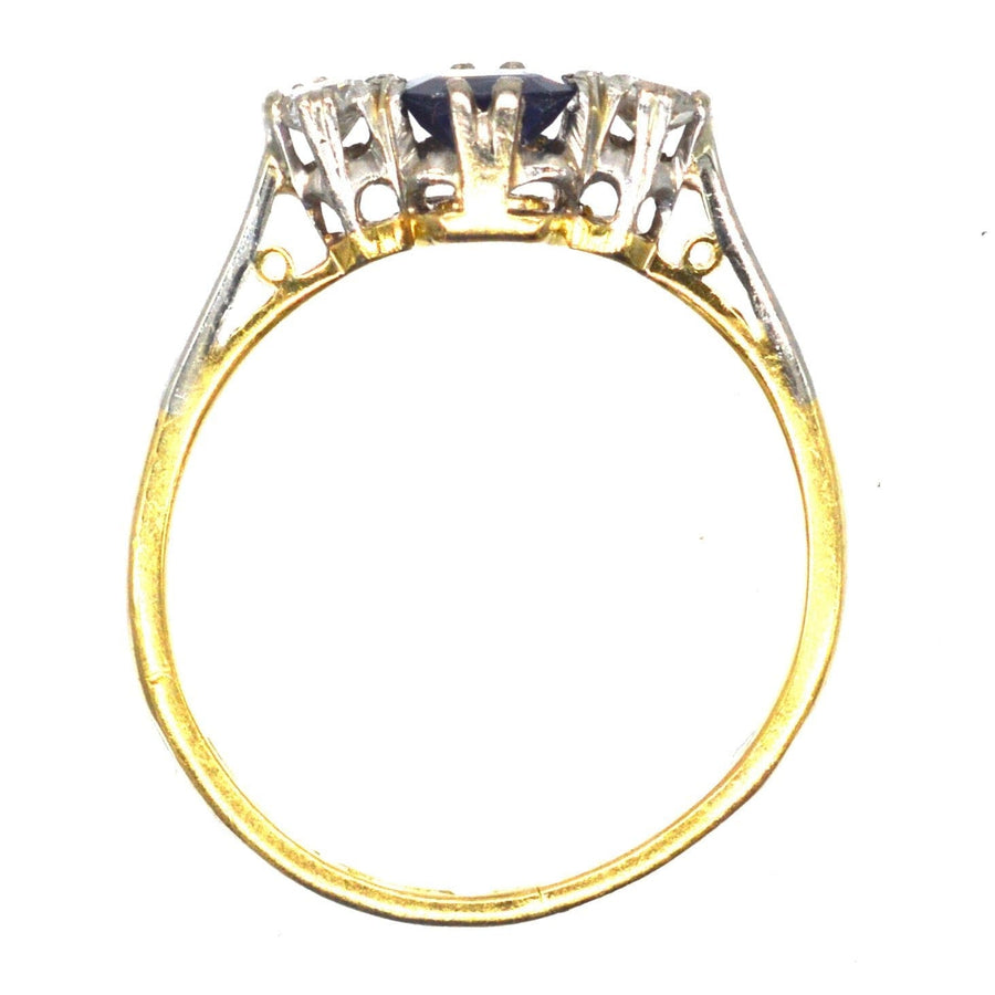 1940s 18ct gold and platinum Asscher cut sapphire and diamond three stone ring profile view