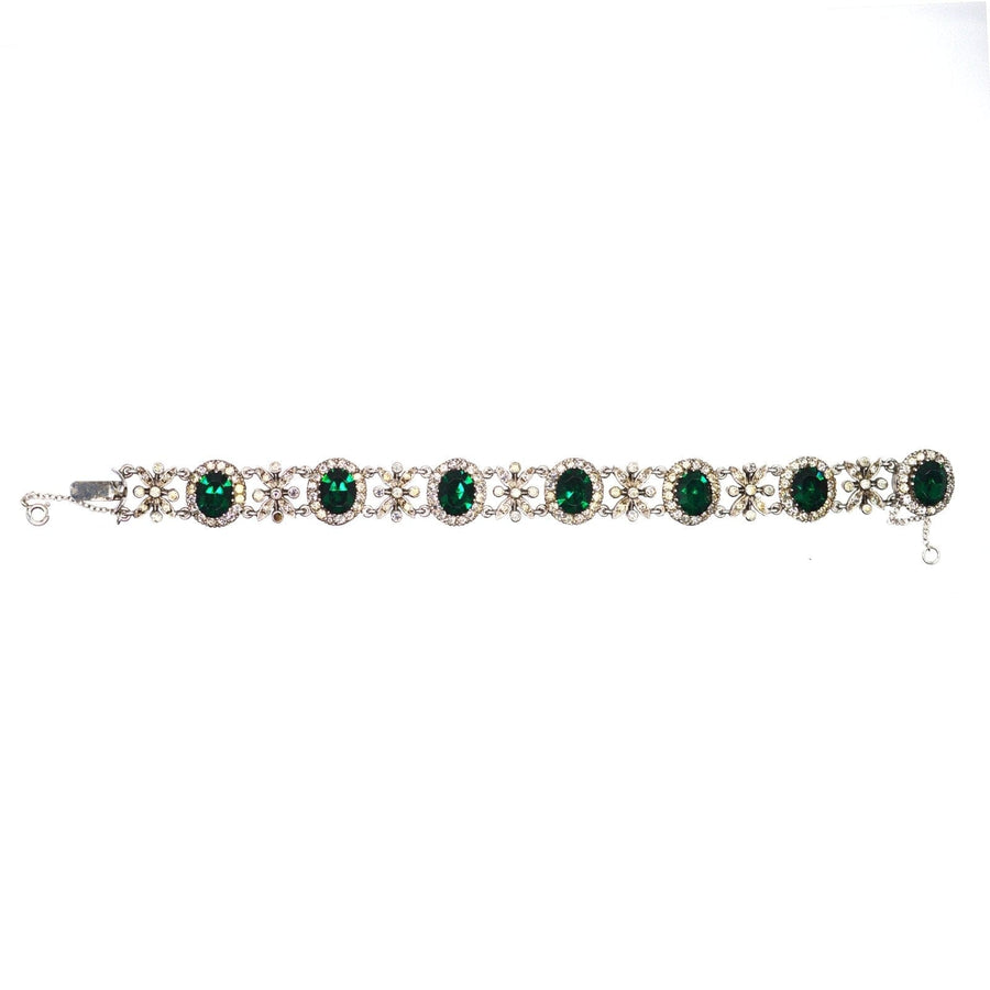 1960s green tourmaline paste bracelet with intricate silver detailing, part of a stunning jewelry parure.