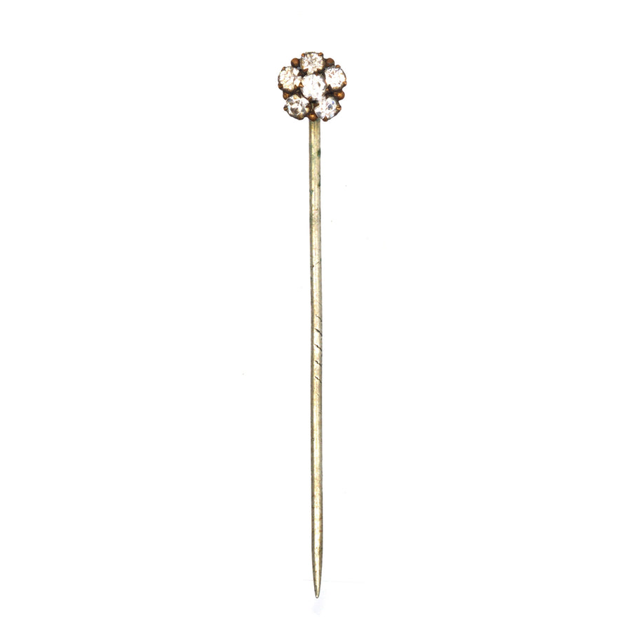 Art Deco gilt metal paste cluster tie pin, designed to enhance colorful silk ties, featuring a floral cluster of sparkling stones.