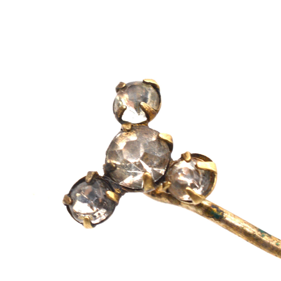 Art Deco gilt metal tie pin with three sparkling paste stones, elegant accessory for colorful silk ties.