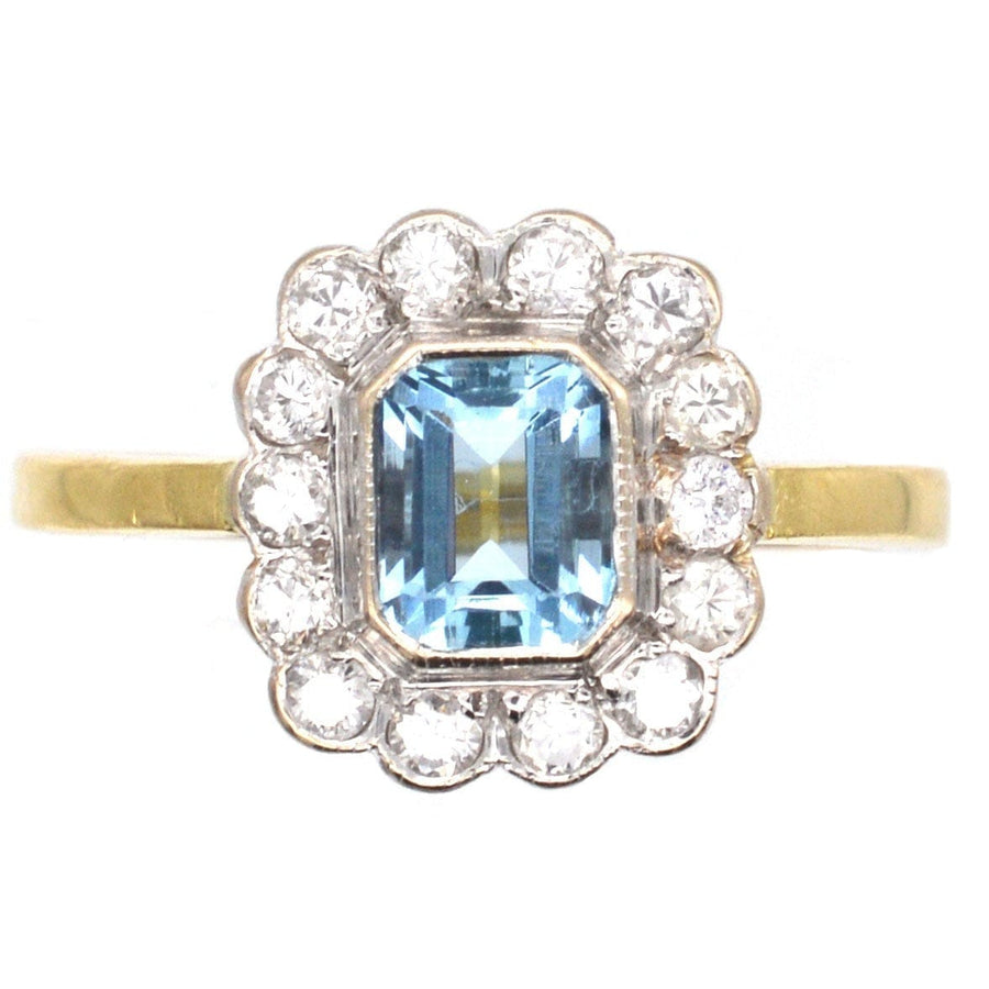 Vintage 18ct gold aquamarine and diamond cluster ring, stylish and elegant design from 1988, perfect for engagement.