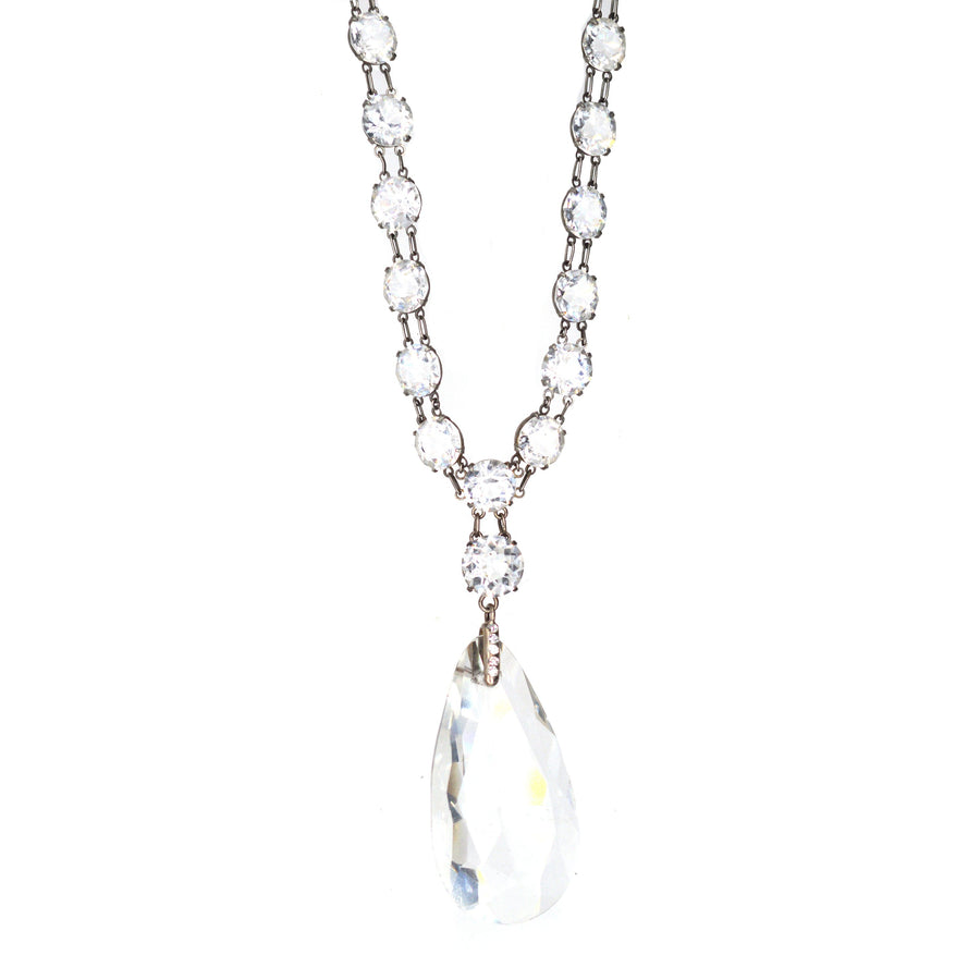 Art Deco silver long necklace with white paste stones and pear pendant for elegant occasions.