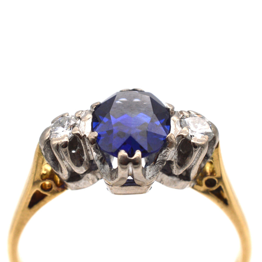 Art Deco 18ct gold sapphire and diamond three stone ring with velvet-like sapphire and sparkling diamonds.