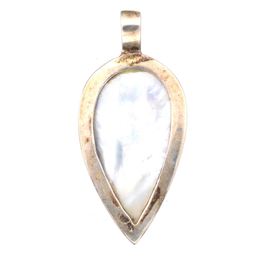Modern pendant featuring blue john and mother of pearl in a reverse pear shape, showcasing unique gemstone colors.