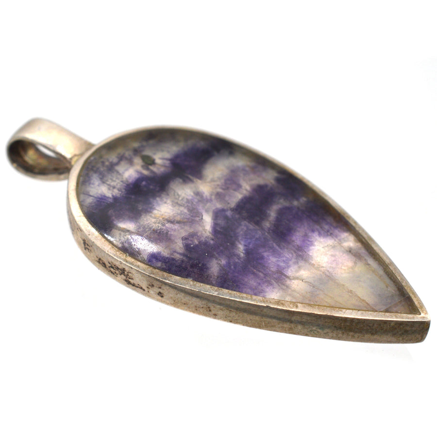 Modern silver pendant featuring a blue john gemstone in reverse pear shape with purple and yellow bands.