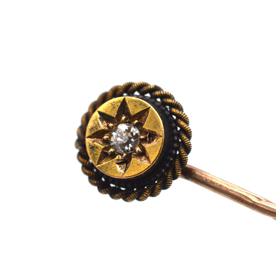 Victorian 15ct gold tie pin with star motif and diamond, featuring rope detail, circa 1880s.