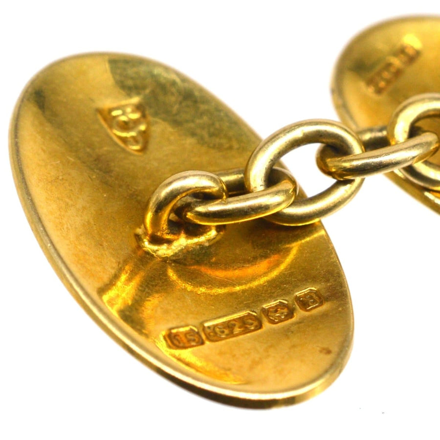 Art Deco 15ct gold plain oval cufflinks by G H Johnstone & Co, featuring hallmarks and timeless design.