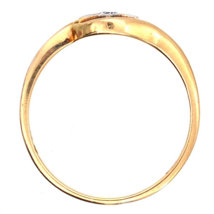 Art Deco 18ct gold diamond twist ring featuring a star motif, showcasing exquisite craftsmanship and geometric design.