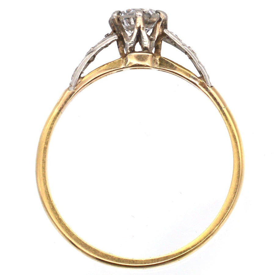 Art Deco 18ct gold diamond solitaire ring showcasing a 0.35 carat white diamond and intricate side details.