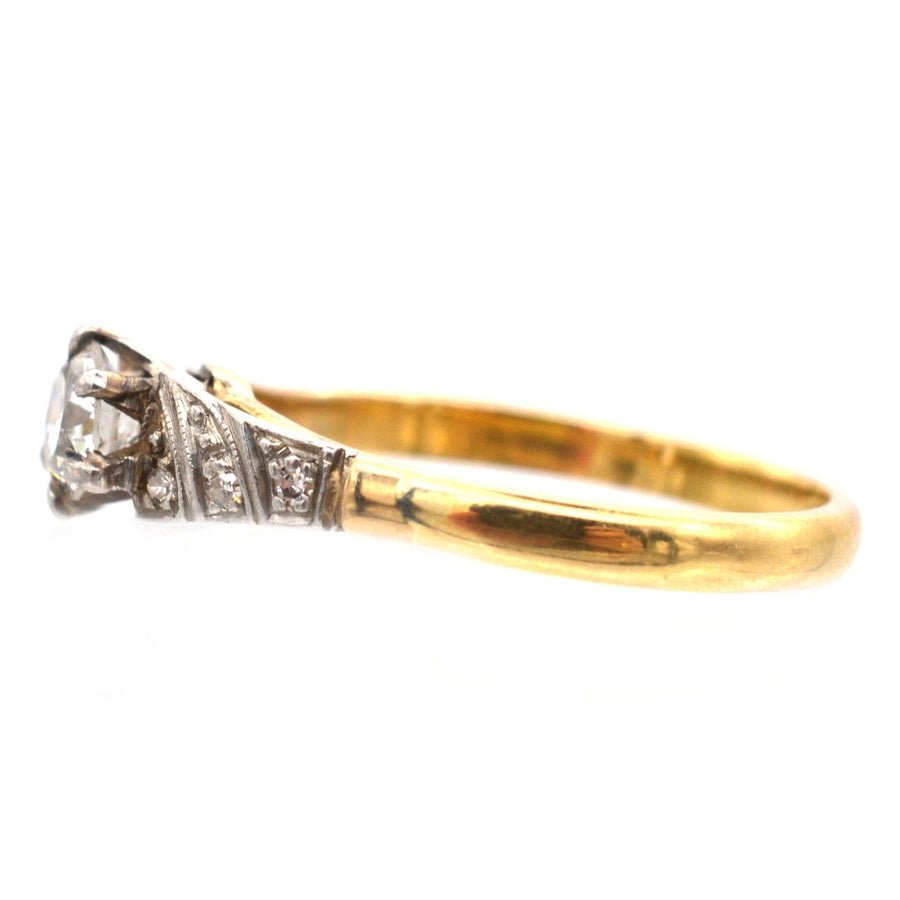 Art Deco 18ct gold diamond solitaire ring, featuring a 0.35 carat white diamond with decorative detailing.