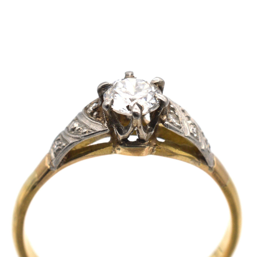 Art Deco 18ct gold diamond solitaire ring featuring a 0.35ct white diamond and intricate detailing.