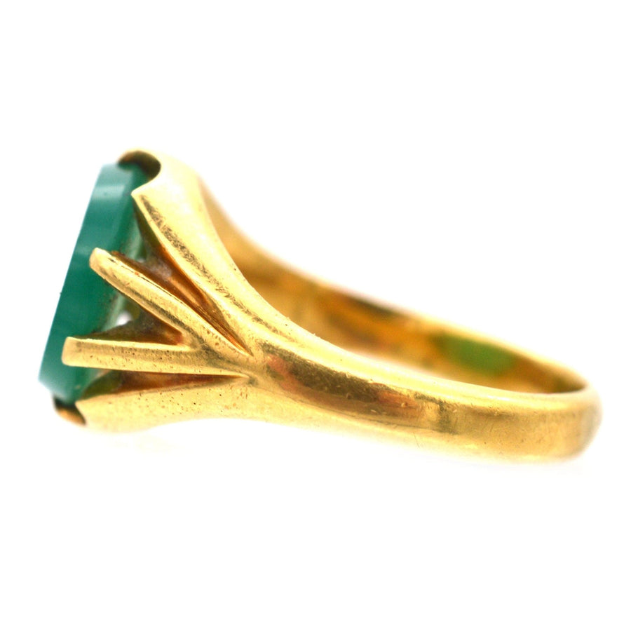 Art Deco 18ct gold signet ring featuring a rich green chalcedony stone and unique ridged shoulders.