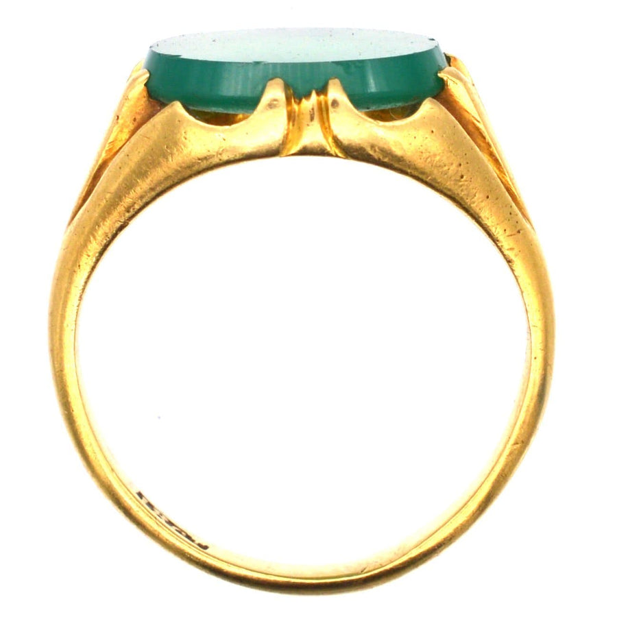 Art Deco 18ct gold signet ring with rich green chalcedony and unique ridged shoulders, perfect for gifting.