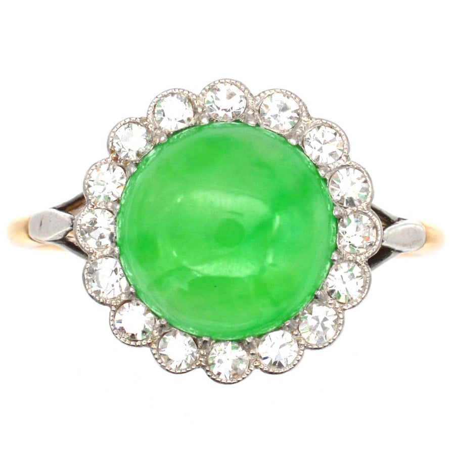 Art Deco 18ct gold ring featuring certified Grade A Imperial Jade and diamond cluster, showcasing vibrant green jade and bright diamonds.