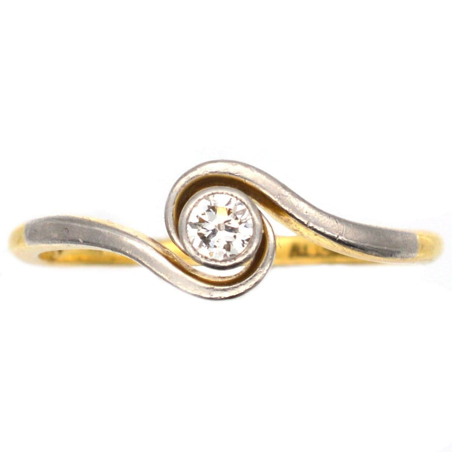 Art Deco 18ct Gold & Platinum twist solitaire ring with diamond bezel setting, perfect for everyday wear.