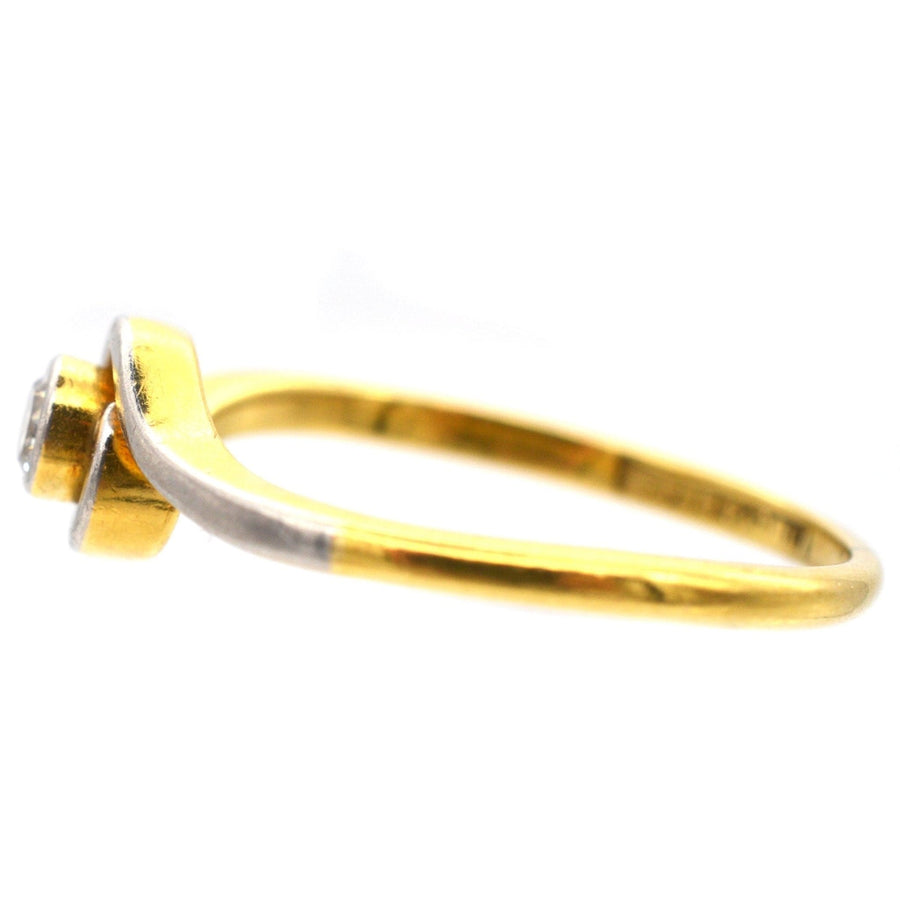Art Deco 18ct gold and platinum diamond bezel twist solitaire ring, showcasing a 0.10 carat diamond.