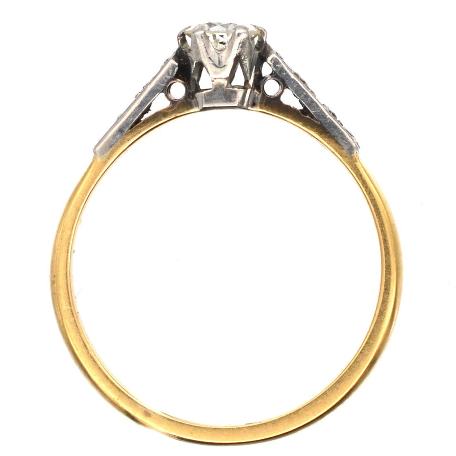 Art Deco 18ct gold and platinum diamond solitaire ring, circa 1920s, featuring diamond shoulders.