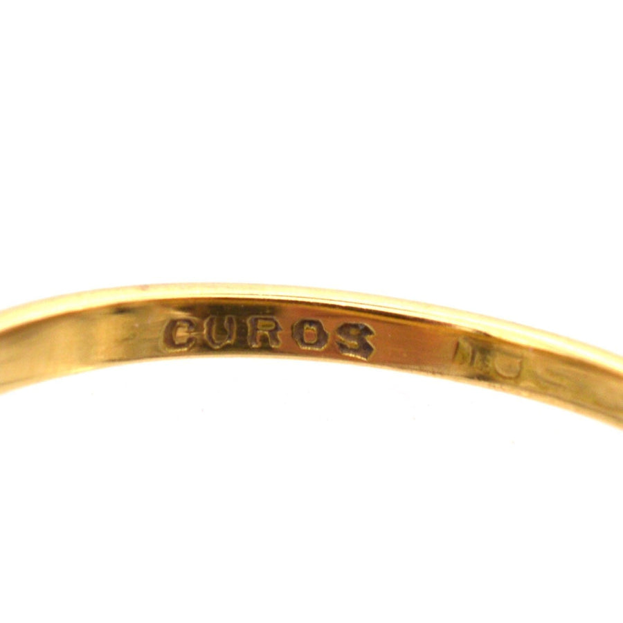 Close-up of the inner band of an Art Deco diamond tiara ring showcasing the 18ct gold hallmark.