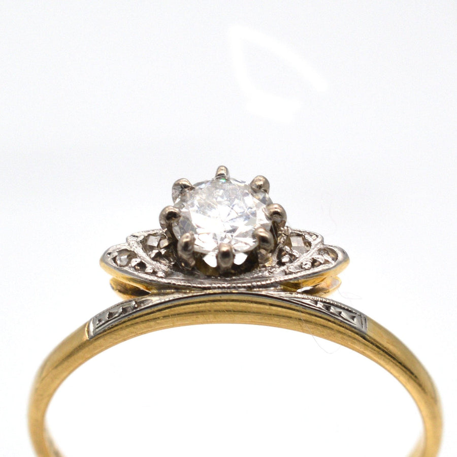 Art Deco 18ct gold and platinum diamond tiara ring with a central white diamond, elegant and unique engagement ring.