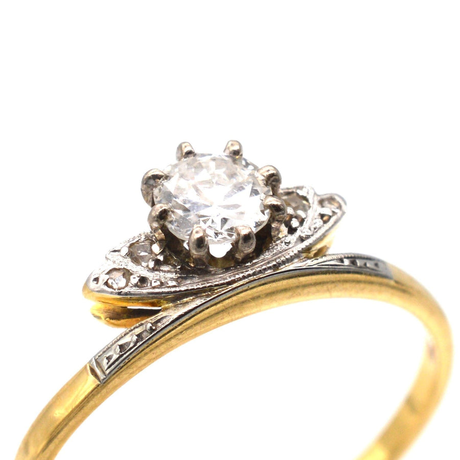 Art Deco diamond tiara ring in 18ct gold and platinum, featuring a central white diamond and elegant design.