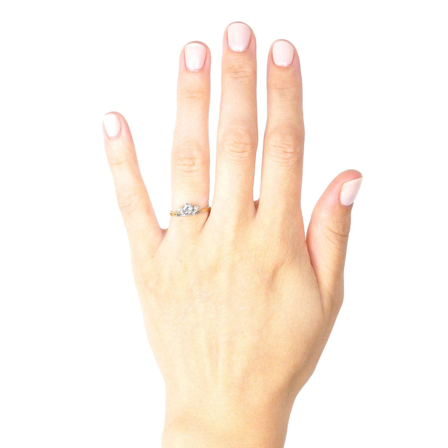 Art Deco 18ct gold and platinum diamond tiara ring worn on hand, showcasing its elegant design and center diamond.