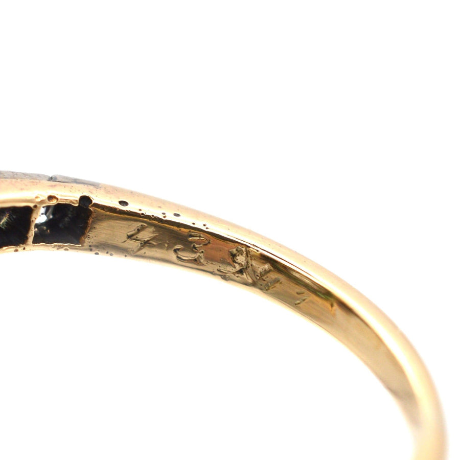 Hallmark of an Art Deco 18ct gold ring, showcasing the authentic 1925 inscription and fine craftsmanship.