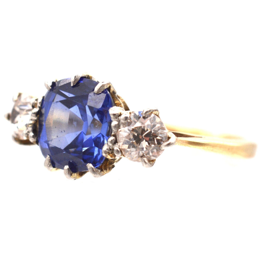 Art Deco 18ct gold and platinum three stone ring with sapphire and diamond, ideal for engagement.