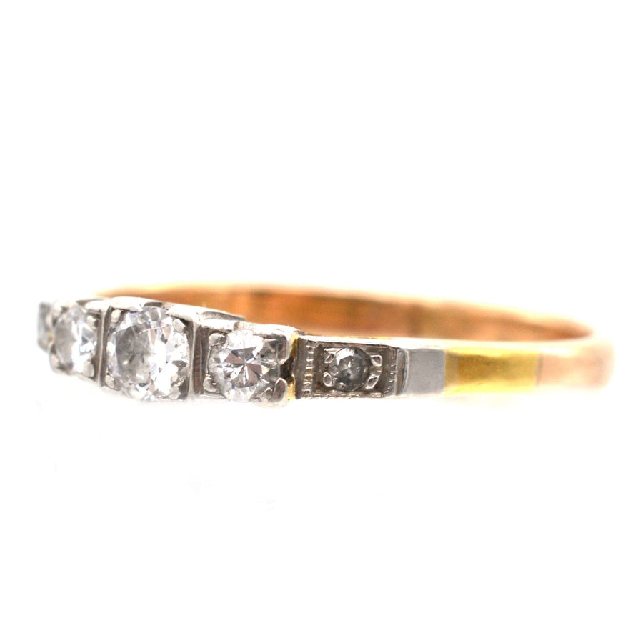 Art Deco 18ct gold and platinum three stone diamond ring with diamond shoulders, elegant vintage style.