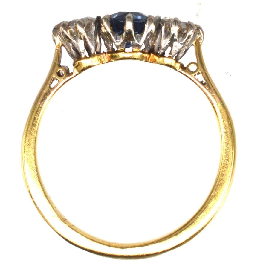 Art Deco 18ct gold sapphire diamond three stone engagement ring, size K, showcasing vibrant natural sapphire and diamonds.