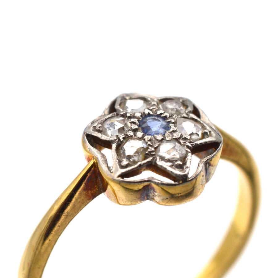 Art Deco 18ct & Platinum diamond and sapphire flower star ring featuring rose cut diamonds and a central sapphire.