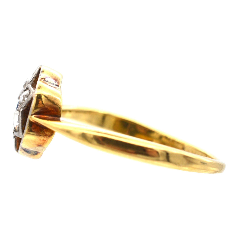 Side view of Art Deco 18ct & Platinum flower star ring set with diamonds and sapphire, perfect for engagement.