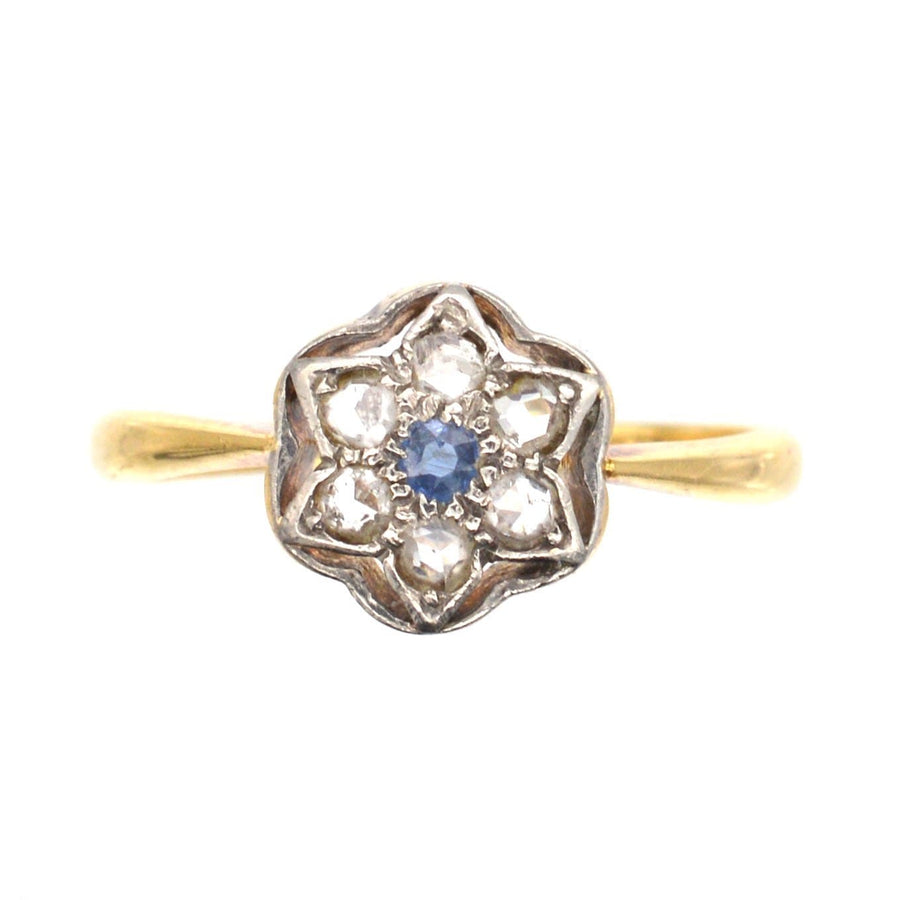 Art Deco 18ct & Platinum diamond and sapphire flower star ring, featuring rose cut diamonds and a central sapphire.