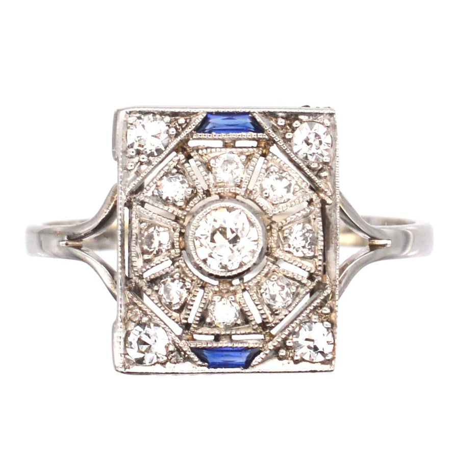 Art Deco 18ct white gold and platinum diamond sapphire plaque ring with bold geometric design.