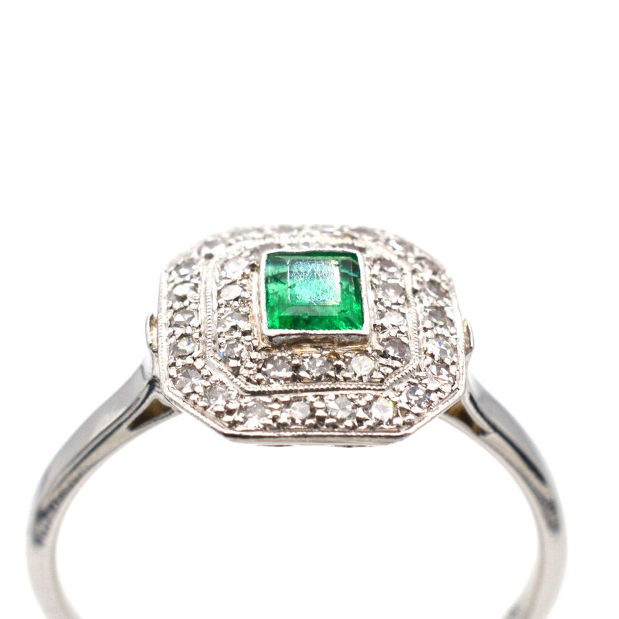 Art Deco 18ct white gold and platinum emerald and diamond ring, vintage 1920s elegance with millegrain set diamonds.