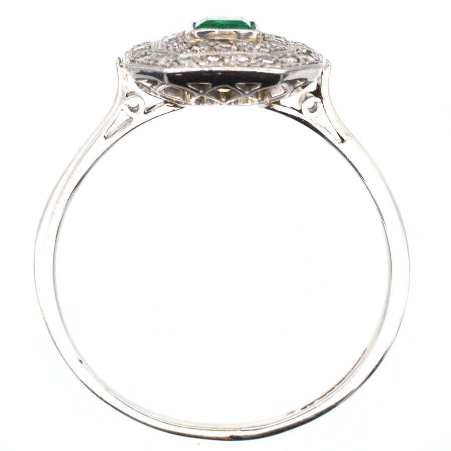 Art Deco 18ct white gold and platinum emerald and diamond ring, showcasing exquisite design and craftsmanship.