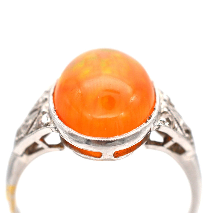 Art Deco 18ct white gold ring featuring a vibrant natural Mexican fire jelly opal gemstone.