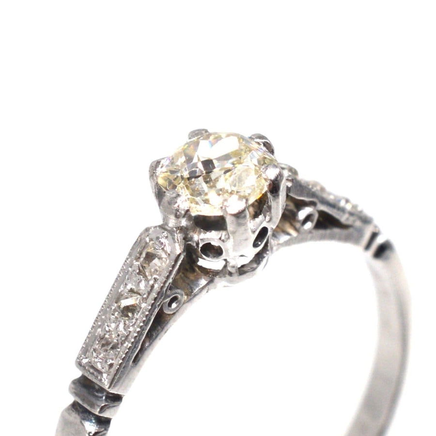 Art Deco 18ct white gold and platinum old mine cut diamond solitaire ring with side diamonds