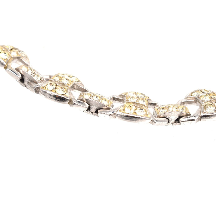 Art Deco chrome paste bracelet featuring geometric shapes and sparkling stones, perfect for stylish accessorizing.