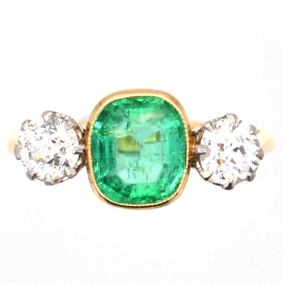 Art Deco 18ct gold and platinum emerald and diamond three stone ring with vibrant green emerald and sparkling white diamonds.