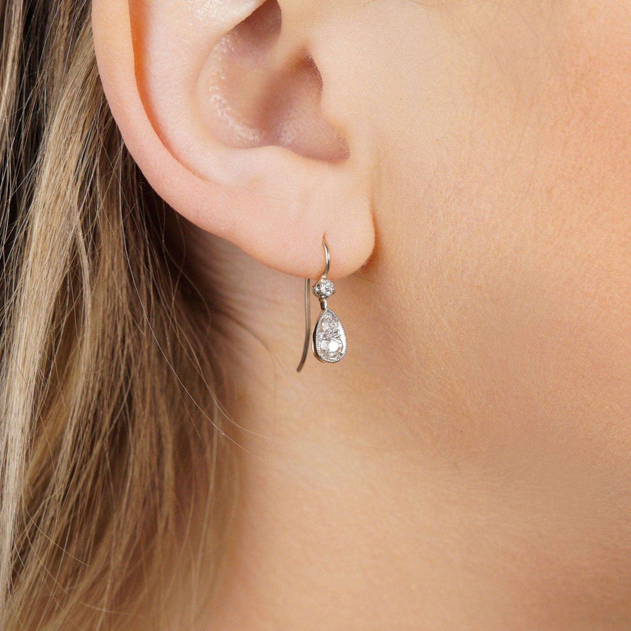 Edwardian 15ct gold and platinum drop earrings showcasing old cut diamonds, circa 1900.